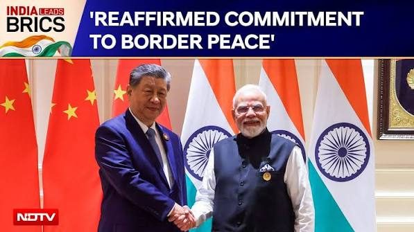 Border peace 'essential' for better ties: Modi tells Xi